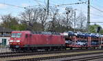 DB Cargo Deutschland AG [D] mit ihrer  145 002-2  [NVR-Nummer: 91 80 6145 002-2 D-DB] und einem PKW-Transportzug am 02.05.23 Vorbeifahrt Magdeburg Hbf.