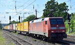 DB Cargo AG, Mainz mit ihrer  152 084-0  [NVR-Nummer: 91 80 6152 084-0 D-DB] und DHL KLV-Zug Richtung Containerterminal Großbeeren am 15.05.24 Höhe Bahnhof Saarmund.