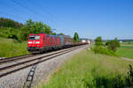 185 197 DB Cargo mit einem gemischten Güterzug bei Oberdachstetten Richtung Würzburg, 13.06.2021