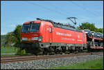 DB Cargo 193 394  Schienenbrücke Ukraine  am 28.04.2025 mit einem Autozug bei Thüngersheim im Maintal.