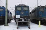 EGP 140 656-0 am 17.02.2026 in der Railpool Lokservicestelle in Hamburg-Altenwerder. Durch den Zaun fotografiert.
