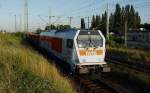HVLE V490.1 mit Dngerzug am 16.7.09 in Halle/Saale.