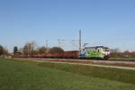 6193 774  20 Jahre Lokomotion  war mit einem  Schrottzug  in Richtung Freilassing unterwegs. Aufgenommen am 8. April 2026 bei Übersee am Chiemsee.