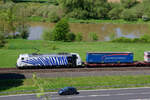 Lokportrait von 185 661 Lokomotion  Paul  mit einem Paneuropa/Terratrans KLV-Zug bei Himmelstadt Richtung W�rzburg, 07.05.2022