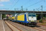 146-03 (146 503) mit metronom bei der Ausfahrt in Hamburg Harburg, August 2025.