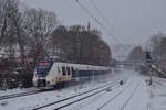 442 153 rauscht als RB48 durch Wuppertal Sonnborn in Richtung Wuppertal Vohwinkel.
