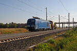 Mit einer Schotterverteil- und Planiermaschine SSP 2000 von Spitzke am Haken rollte am Morgen des 25.07.26 248 049 von northrail durch Brehna Richtung Halle(S).