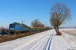 140 007 Press mit einem leeren ARS-Zug im verschneiten Dörverden am 13.02.2021