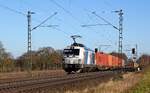 RRL 248 014 (90 80 2248 014-3 D-NRAIL), vermietet an RheinCargo, mit Containerzug DGS 68735 Bremen-Grolland - Bönen (Bohmte-Stirpe, 25.02.2026).