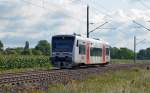 Eine der wenigen noch von der MRB betriebenen Strecken ist die von Eilenburg Ost nach Halle(S). Am 16.08.14 rollt VT 015 auf dem Weg nach Halle(S) durch Kyhna.
