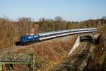 TRI 110 428-0 mit RB40 Ersatzzug in Bochum, Februar 2022.