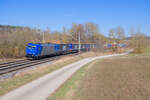 185 505 ATLU/TXL mit einem KLV-Zug bei Lehrberg Richtung Ansbach, 01.03.2022