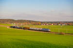 185 540 TXL  EC Kassel Huskies  mit einem KLV-Zug bei Oberdachstetten Richtung W�rzburg, 28.04.2022