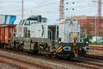 4185 101-7 Nexrail DE18  Verkehrsgemeinschaft Landkreis Osnabrück  mit Güterzug in Hilden, März 2026.