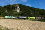 Vossloh DE18 (4185 015-9) mit ein paar Kesselwagen am 3.7.26 bei Breitenfurt.