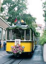 SSB__Zahnradbahn__Nächstes Jahr werden es 140 ! Tw 104 [ME,AEG 1950] im Blumenschmuck bei der Festveranstaltung zum 100.