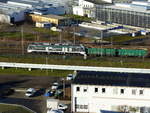 Die Starkenberger Baustoffwerke mit neuer Technik in Form der Eurodual 159 211-2 ( 9080 2159 211-2 D-RCM ) in Gera am 19.12.2020