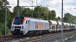 hvle - Havelländische Eisenbahn AG, Berlin-Spandau [D] mit der Eurodual Lok  159 008  [NVR-Nummer: 90 80 2159 008-2 D-HVLE] und einem Schüttgutwagenzug mit Sand beladen am 31.08.23
