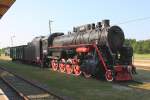 Gterzug Dampflok L 1646, aus sowjetischer Produktion Baujahr 1951,  steht hier am 12.6.2011 fotogen im Gleisbereich des ehemaligen Bahnhof  Haapsalu.