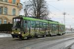 Fahrzeug 118 (ehemals Fahrzeug 60) der HKL/HST vom Typ Valmet MLNRV 1 mit Werbelackierung von UPM-Kymmene Oyj auf der Linie 3 (Olympiaterminaali – Meilahti) am 31.12.2021 kurz hinter der