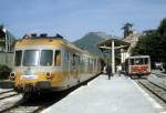 Bahnhof Digne (Département Haute-Provence): Zwei Alpazur-Züge, ein SNCF-Triebzug (RGP) und ein CP-Triebwagen (SY 04), halten am Bahnsteig im Juli 1982.