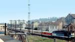 Frankreich, Rhne-Alpes, Savoie, Aix-les-Bains. Die BB 67413 mit dem Tee (1969-1982) Catalan-Talgo Barcelona-Genf bei der Ausfahrt aus dem Bahnhof von Aix-les-Bains in Richtung Culoz, Scan eines Dias aus dem Jahr 1975