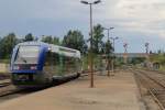 73698 mit TER 873938 Brive la Gaillarde-Aurillac auf Bahnhof Saint Denis près Martel am 29-6-2014.