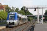 76581 mit TER 830600 Strasbourg-Wissembourg auf Bahnhof Haguenau am 6-7-2014.