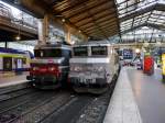 SNCF-BB22387 in Multiservice-Lack und SNCF-BB22237 in silbergrauer Fantôme-Lackierung.

Paris-Nord 2014-07-18 