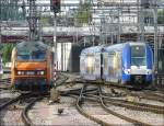 Hier scheint der Bahnhof von Luxemburg fest in franzsischer Hand zu sein. Rechts der Triebzug 338 bei der Einfahrt aus Richtung Nancy und links die  Sybic  26165 beim Umsetzen am 22.06.08 (Jeanny)