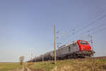 Akiem E37 530 mit Kesselzug in Fahrtrichtung Angermünde.