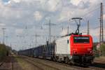 CBR E37 510 am 11.4.12 mit einem Stahlzug bei der Durchfahrt durch Ratingen-Lintorf.