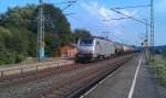 Akiem 37031 mit einem Kesselwagenzug am 27.07.2012 in Gundelsdorf. 