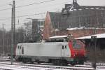 Captrain E37 520 wartet am 23.1.13 auf ihren Zug nach Bous (Saar) in Dsseldorf-Rath.