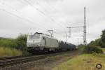 E 37 511 mit Rungenwaggons am 08.08.2013 in Köln Porz-Wahn.