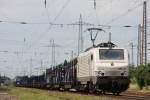 Akiem/TWE E37 511 am 26.6.13 mit einem Stahlzug in Ratingen-Lintorf.