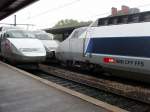 TGV PSE der SNCF und TGV Lyria der SBB in Djion.