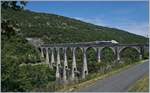 Eine Stunde später im besten Licht: der Cize-Bolozon Viadukt mit dem TGV Lyria Genève - Paris.

17. Juli 2019