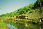 Arzwiller im July 1988, die BB 16692 mit einen (kurzen !) Gterzug....