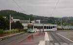 Tram STAS-918 unterwegs als T1 am Hôpital-Nord.
Die Straßenbahn des Typs Vevey-Alsthom wurde 1998 geliefert. 

Die Société de Transports de l’Agglomération Stéphanoise, kurz STAS, betreibt den öffentlichen Nahverkehr in Saint Étienne. An der Bezeichnung Stéphanois für die Saint Étienne lässt sich erkennen, dass Étienne die französische Ableitung von Stephanus bzw. Stefan ist. Seit 1881 verkehren ohne Unterbrechung meterspurige Straßenbahnen in Saint Étienne. Dass das Netz, auch in der Innenstadt, nie stillgelegt wurde, ist in Frankreich eine völlige Ausnahme. 
Heute existieren 3 Straßenbahnlinien. 

2014-07-21 Saint Étienne Hôpital-Nord