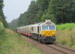 247 055-7 der EuroCargoRail ist am 05. September 2012 mit dem Traunsteiner Mllzug bei Tling unterwegs.