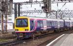 323 223 First fhrt am 22.04.2005 in den Bahnhof Manchester Piccadilly ein.