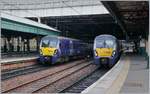 Die beiden Triebwagenzüge 334 015 und 334 020 warten in Edinburgh Waverley / Waverley Dhùn Èideann auf ihre nächsten Einsätze.