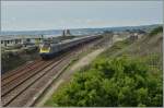 Der First Great Western Class 43 HST 125 von London kommend, erreicht bei Long Rocks nach einer langen Fahrt seit Teigmouth Landesinnere wieder das Meer und wird nach wenigen Meilen sein Ziel Penzance