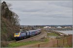 Der HST 125 mit den Triebköpfen  43097 an der Spitze und 43156 am Schluss als  The Cornish Riviera  GWR Service 0844 von Penzance nach Paddington erreicht Dawlish Warren.