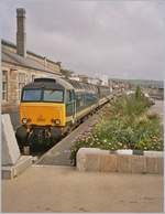 Der Nachtschnellzug aus London Paddington ist in Penzance eingetroffen. Und auch hier, ziemlich unbritish, Palmen am Bahnsteig zur Begrüßung. 
April 2004.