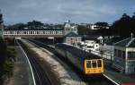DMU 937 verlt auf seiner Fahrt von Newton Abbot nach Paignton den Bahnhof Torquay (April 1992)