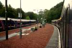 Regenstimmung in den Western Highlands: Zwei Doppeltraktionen Class 156 kreuzen im abgelegenen Bahnhof Ardlui.