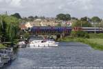 Ely, Boote auf dem Great Ouse, mit Bahnbrcke und First Capital Express 14,06 nach King's Lynn und East Midlands Trains aus Manchester.