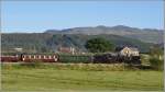 Hinter der Lok 87 luft ein original Welsh Highland Railway Wagen mit.